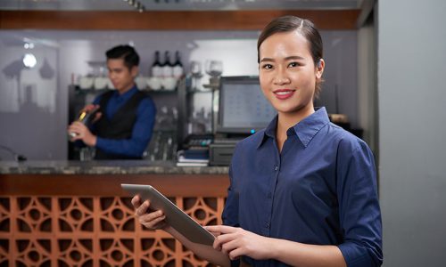 cheerful-bar-owner Diploma of Hospitality Management